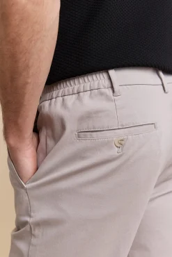 Pleated pant with elastic sides