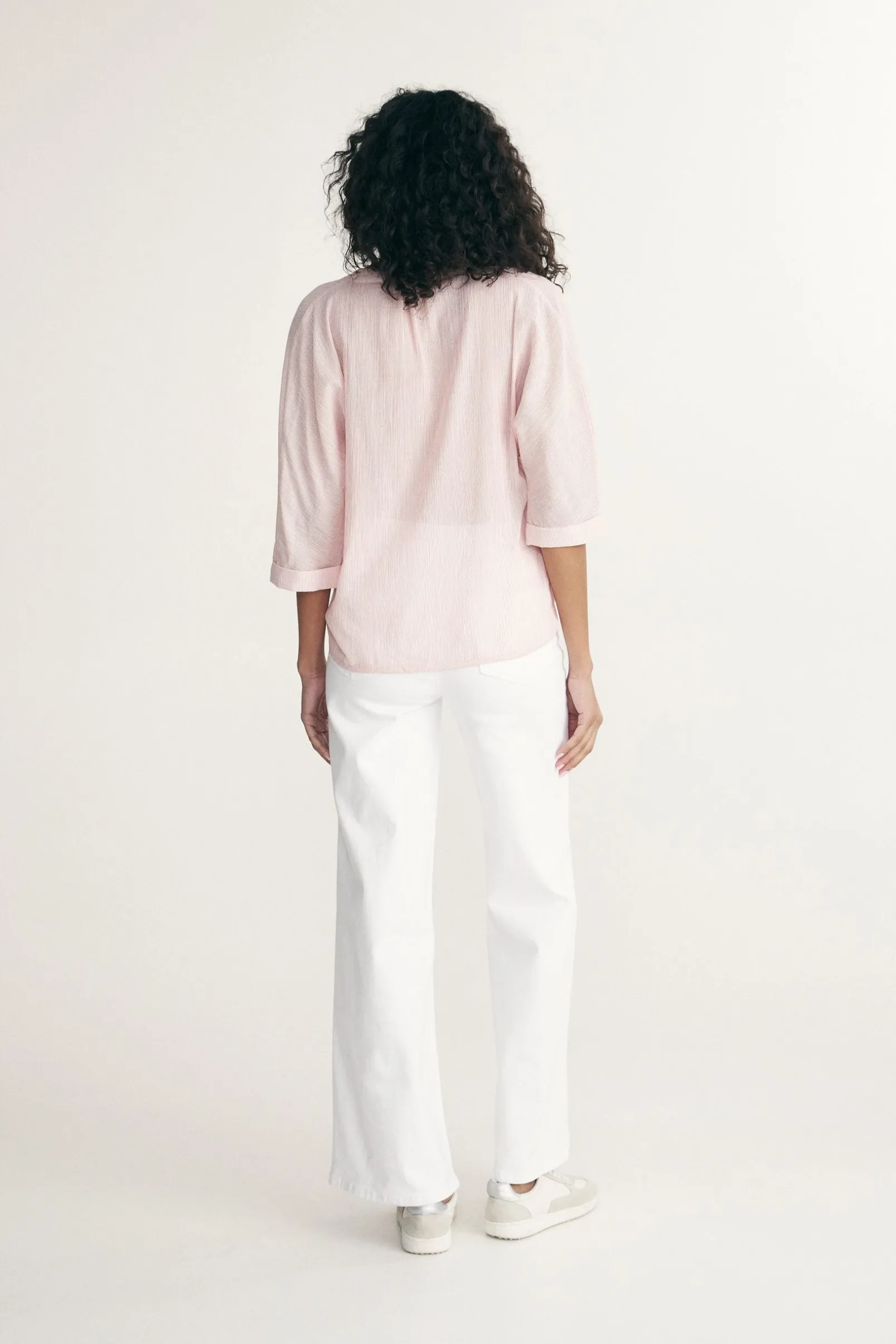 Sleeve dolman top with pleats at front