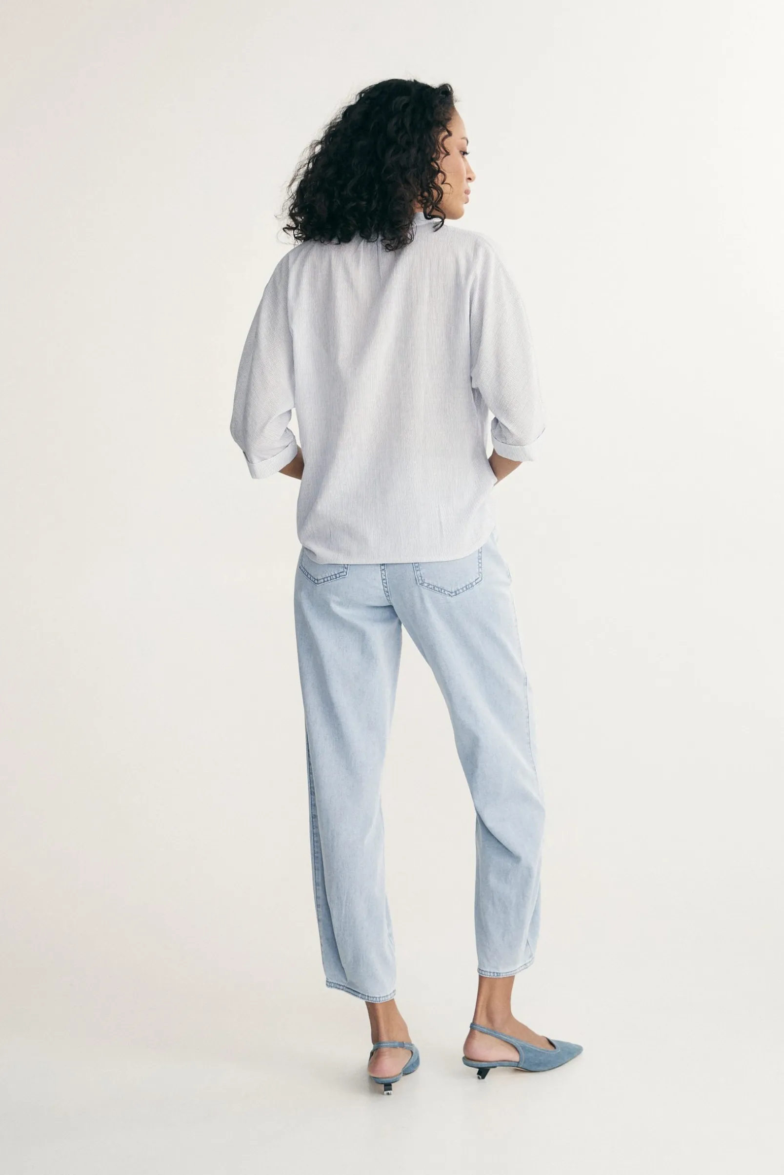 Sleeve dolman top with pleats at front