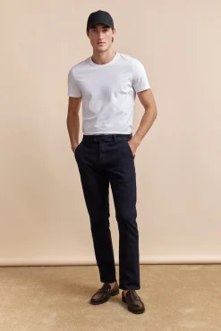 Slim jean with slash pockets