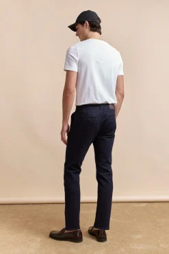 Slim jean with slash pockets
