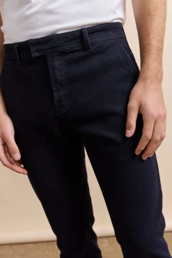 Slim jean with slash pockets